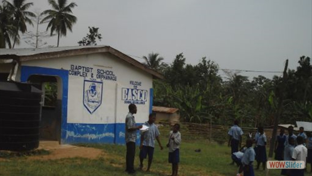 HTG Board member introduces children to the trade of painting